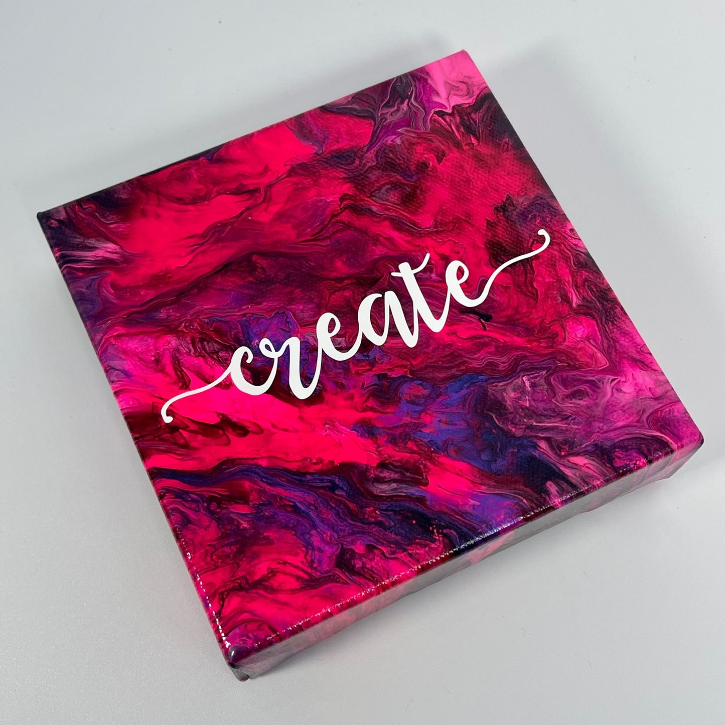 The Rembrandt Create Block. A colorful hand painted painting that says 'create'