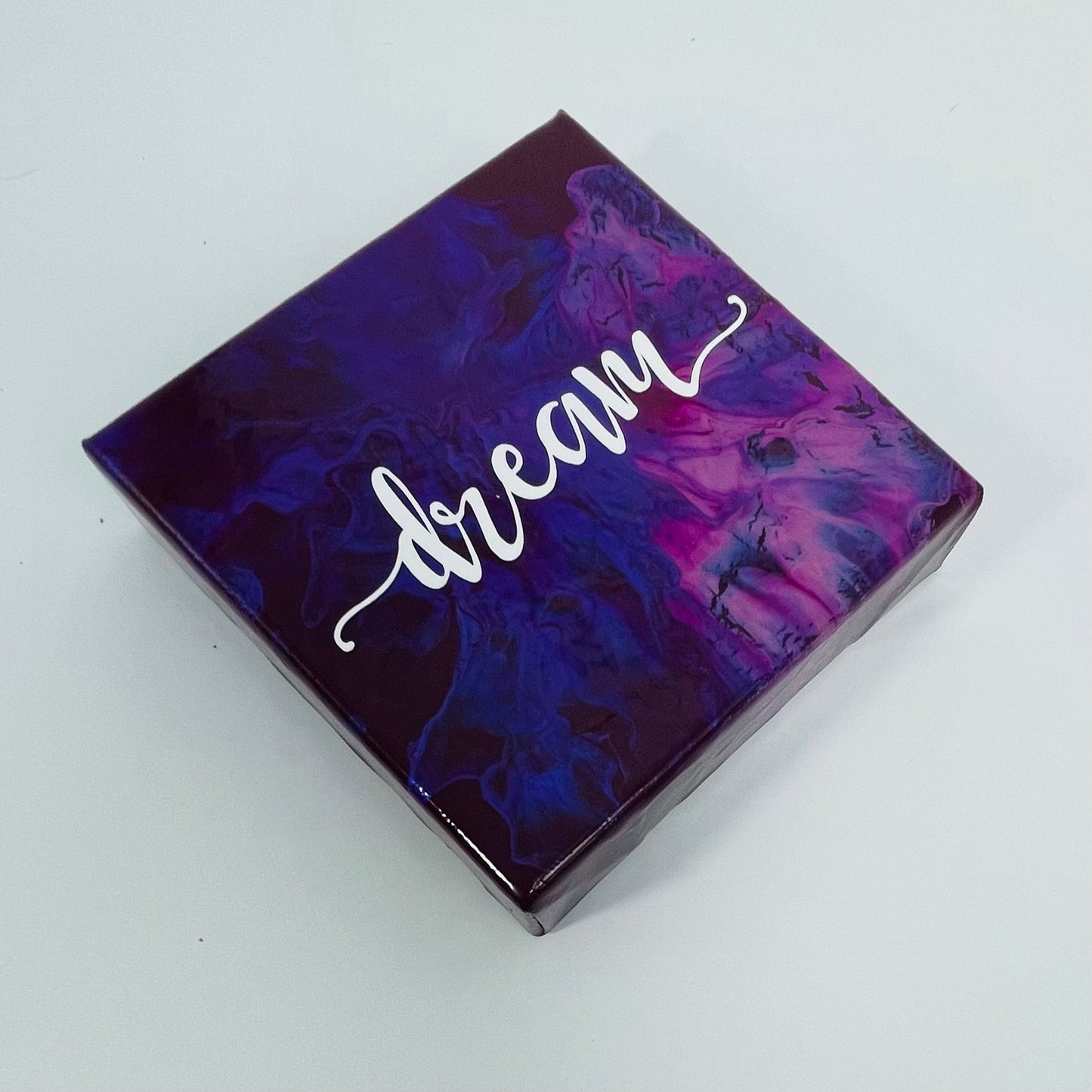 The Vision Dream Block. A colorful hand painted painting that says 'Dream'
